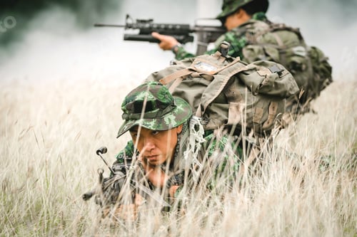 Preview: Soldiers Patrol in Tall Grass Field