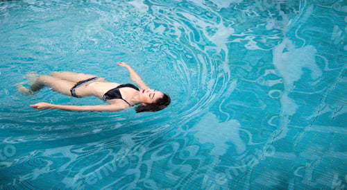 Preview: Happy Asian Woman Smiling On Swimming Pool In Summer