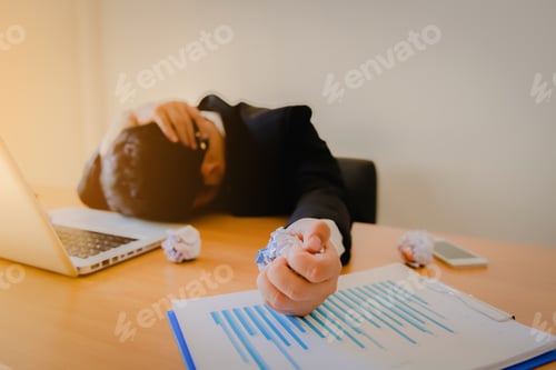 Preview: Stressed Man Working On Laptop