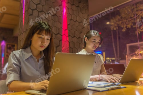 Preview: Asian Office Girls Working On Laptop At Late Night