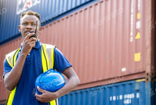 Preview: Adult African American Men Worker Check And Control Loading Freight Containers By Use Radio At