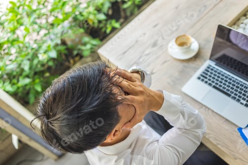 Preview: Asian Businessman Feel Headache And Stressed With Job