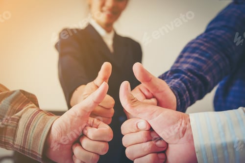 Preview: Close Up Of Young People Putting Their Hands Together. Team With Stack Of Hands Showing Unity And