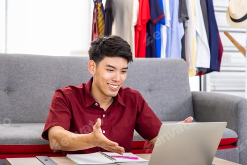 Preview: Young Asian Male Online Merchant Freelance Blogger Is Working Business From Home With Laptop, With