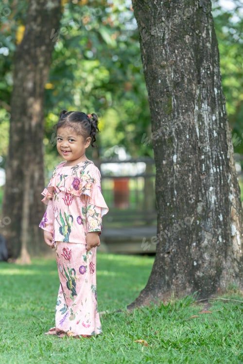 Preview: Cute Malaysian Girl In Eid Costume. Outdoor Portrait.