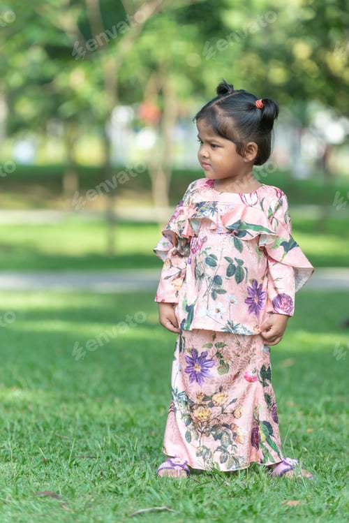 Preview: Cute Malaysian Kid In Eid Costume. Outdoor Portrait.