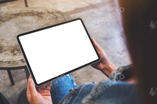 Preview: Mockup Image Of A Woman Holding Digital Tablet With Blank White Desktop Screen