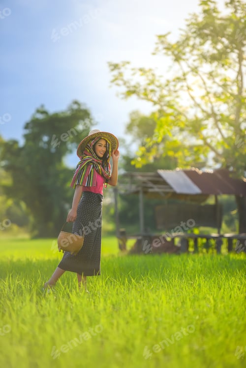 Preview: Asian Farmers In Green Rice Fields.
