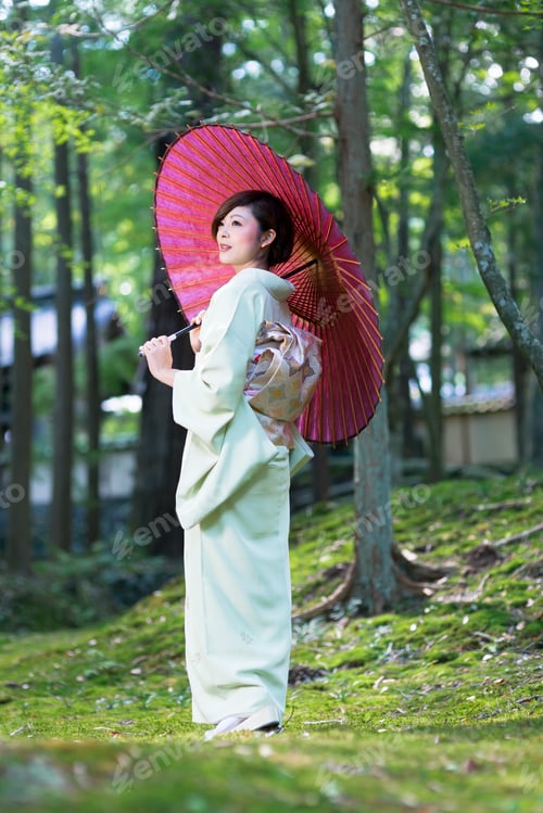 Preview: Beautiful Woman Wearing A Japanese Kimono