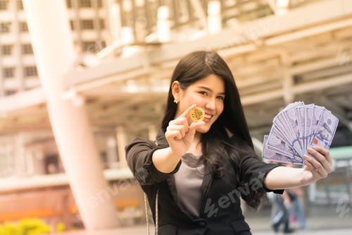 Preview: Successful Business.Business Woman With Golden Bitcoin And Dollar Bunch.Bitcoin The Future Of The