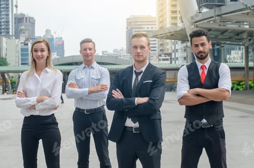 Preview: Portrait Of Four Business Colleagues Doing Confident Gesture Portrait At Outdoor In City. Happy
