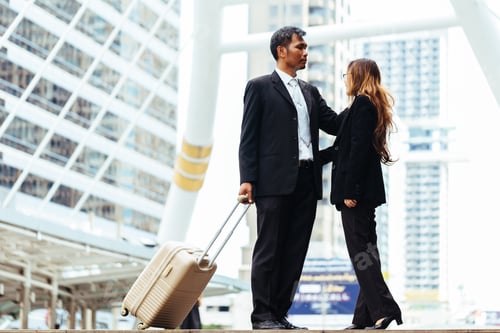 Preview: Young Couple Working Together In City. Business In City Concept.