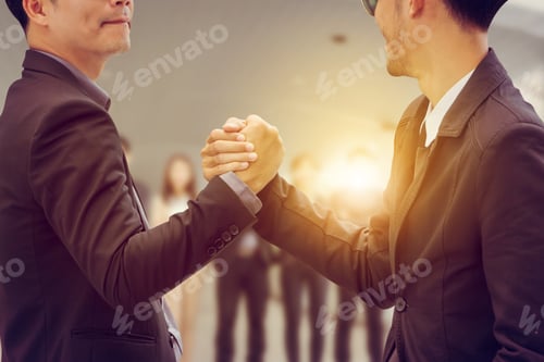 Preview: Businessman Handshake Over Blurred Business People Teamwork Background, Successful Partnership
