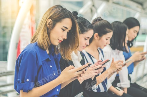 Preview: Group Of Business Women Is Using Gadgets, Talking And Smiling, Sitting Is City Background.