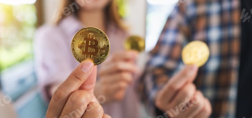Preview: Closeup Image Of A Group Of People Holding And Showing Golden Color Bitcoins In Hands