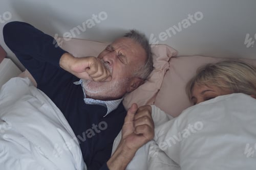 Preview: Happy Elderly Couple Caucasian Senior Man Snoring And Woman Sleeping Together In White Blanket In