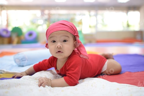 Preview: Asian Cute Baby Playing In The Living Room Colorful.