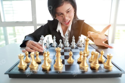 Preview: Businesswoman Playing Chess Board Game Idea Of Management Strategy And Leadership Concept