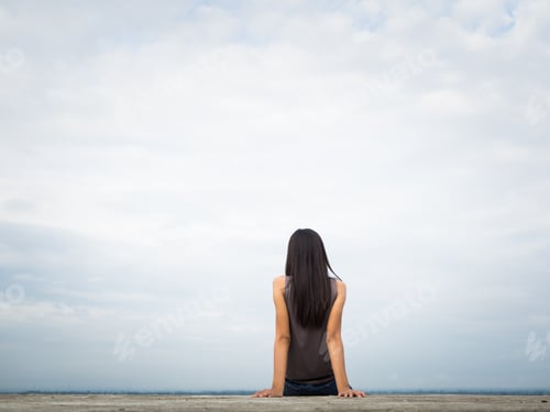 Preview: Beautiful Lonely Young Pretty Girl Sitting On The Roof