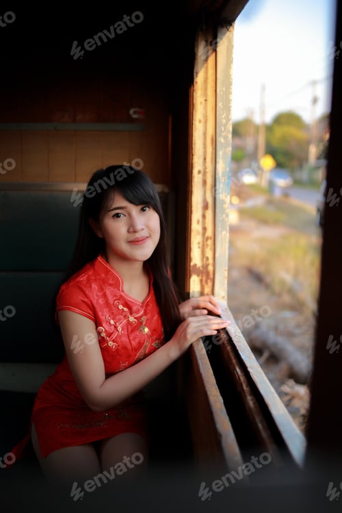 Preview: The Beautiful Lady In Chinese Dress Train Ride. Happy Chinese New Year Concept.