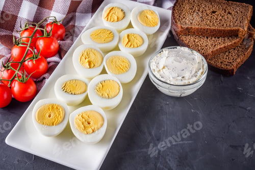 Preview: Boiled Chicken Eggs On A Dark Stone Background