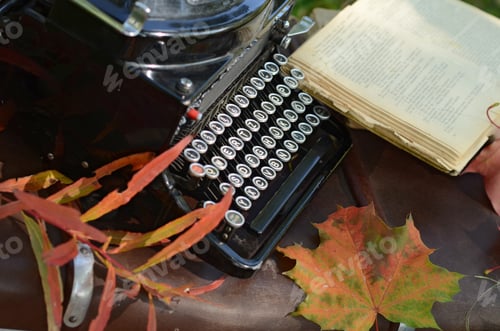 Preview: Romantic Autumn Still Life With Books, Plaid, Vintage Suitcase, Old Typewriter And Leaves