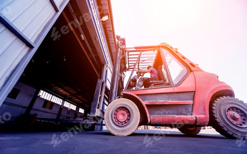 Preview: The Big Industrial Forklift Drives Into The Warehouse.