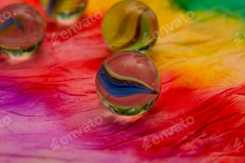 Preview: Glass Coloring Beads On Batik Background.