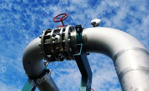 Preview: Industrial Steel Pipelines And Valves Against Sky
