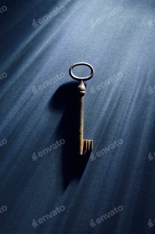 Preview: Vintage Key Over Dark Background With Dramatic Lighting