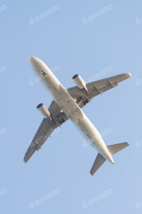 Preview: A White Airplane Is Landing To Airport