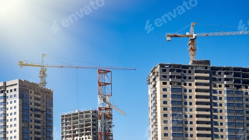 Preview: Construction Of New Residential High-Rise Buildings With High-Rise Cranes On The Background Of A