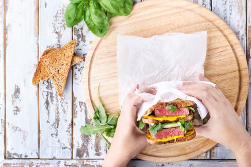 Preview: Club Sandwich With Steak And Halloumi Cheese Served With Mustard Ruccola And Parsley Over A Wooden