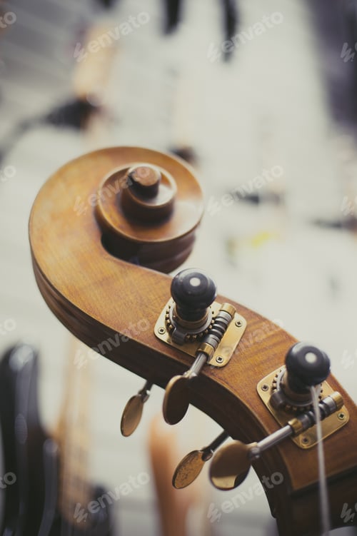Preview: Double Bass Headstock And Tuning Keys Close Up Vintage Color Effect And Out Of Focus Background