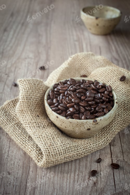 Preview: Coffee Beans In A Bowl On A Wooden Table
