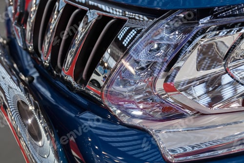 Preview: Type Headlights Of The Blue Vehicle, Note Shallow Depth Of Field