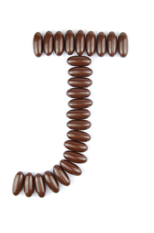 Preview: Alphabet Letter J With Chocolate Candies (Isolated On White Background)