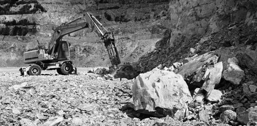 Preview: Excavator With Hydraulic Hammer Crushes Large Stones In A Limestone Quarry, Black And White
