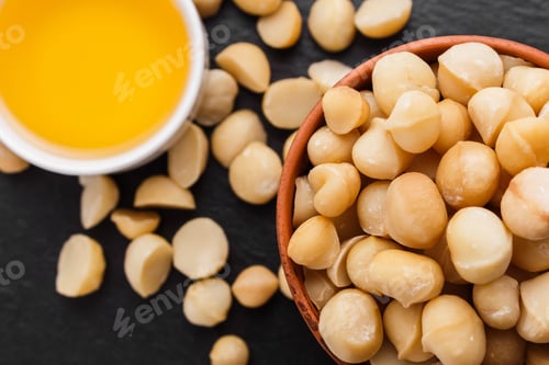 Preview: Delicious Macadamia Nuts On A Dark Stone Background
