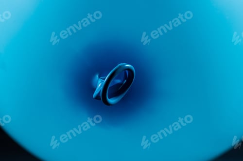 Preview: Neck, Knot And Lip Of An Inflated Blue Balloon.