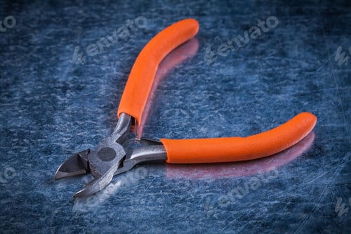 Preview: Insulated Electric Metal Nippers On Metallic Surface Construction Concept.