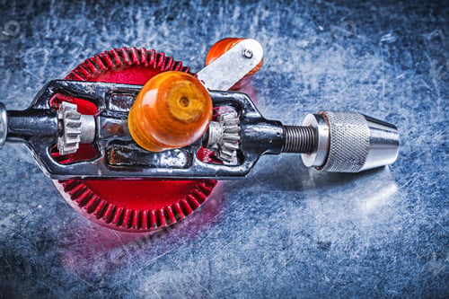 Preview: Vintage Hand Drill On Metallic Background Directly Above.