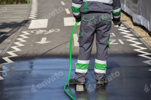 Preview: Washing Cycling Path And Pavement Using The Water Hose, Streets Cleaning And Washing Of City.