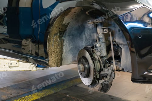 Preview: Detail Of The Replacement Of A Car Disc Brake In The Mechanical Workshop