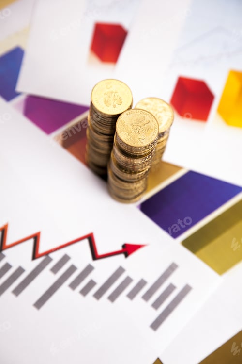 Preview: Stacks of Coins on a Financial Chart