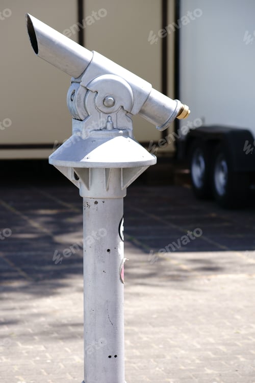 Preview: A Coin Telescope Mounted On A Pillar For Landscape Observation / Coin Telescope