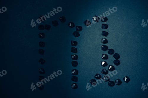 Preview: Symbol Of The Zodiac Sign Virgo Made By Black Stones On A Black Background. Low Dark Key