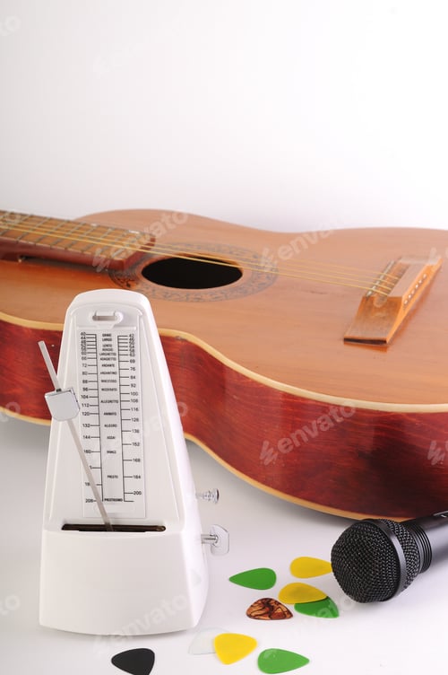 Preview: Guitar And Microphone On A White Background