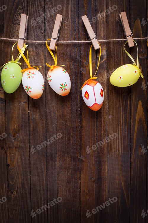 Preview: Colorful Easter Eggs On Clothes Rope. Easter Background.