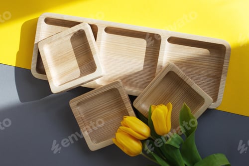 Preview: Wood Empty Plates For Snack And Flowers On The Color Grey And Yellow Background